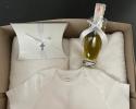 This set includes: 

Tshirt onesie
Greek Olive Oil
Ivory Soap 
2 Hand Towels
1 Bath Towels
1 Oil Sheet